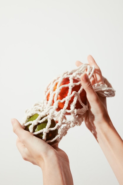 Hands holding embroidered cloth